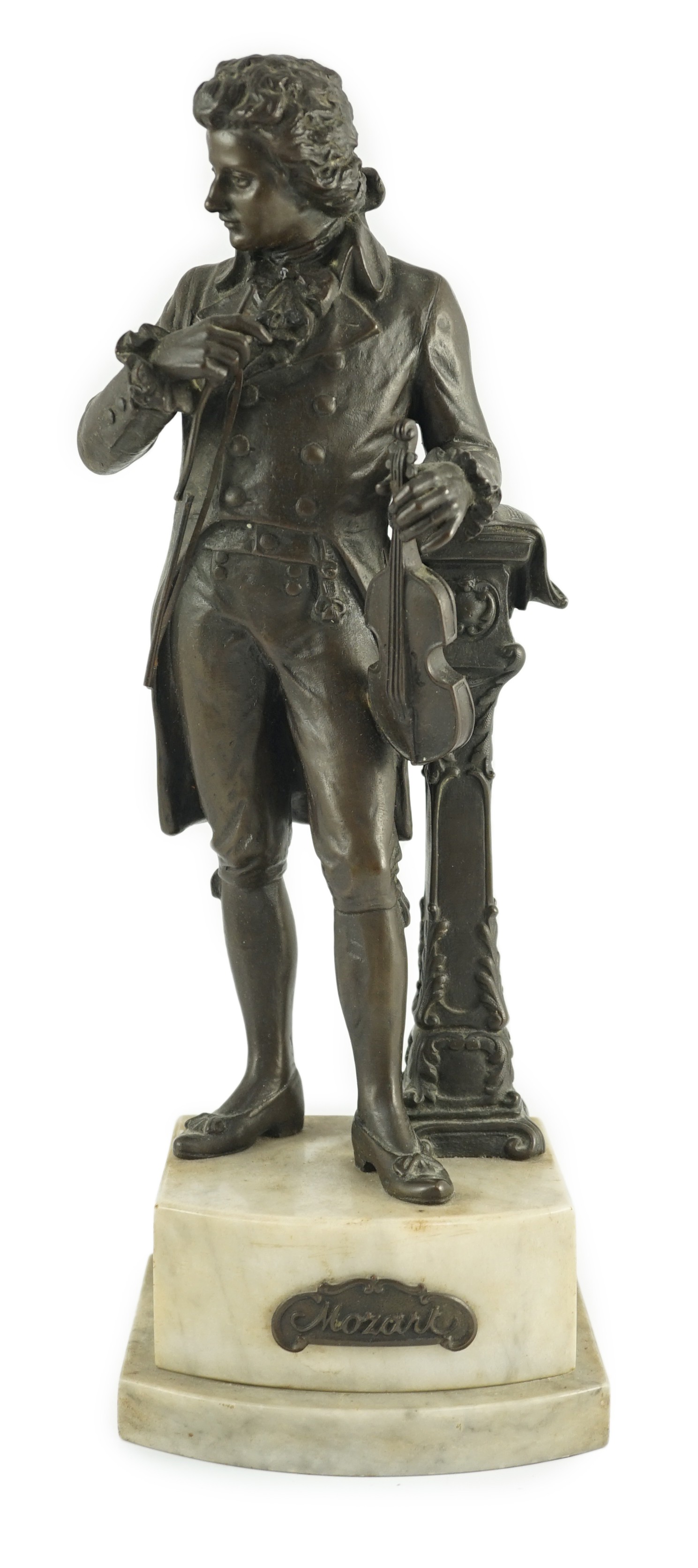 Carl Brose (German, 1880-). An early 20th century bronze figure of Mozart holding a violin, 41cm high